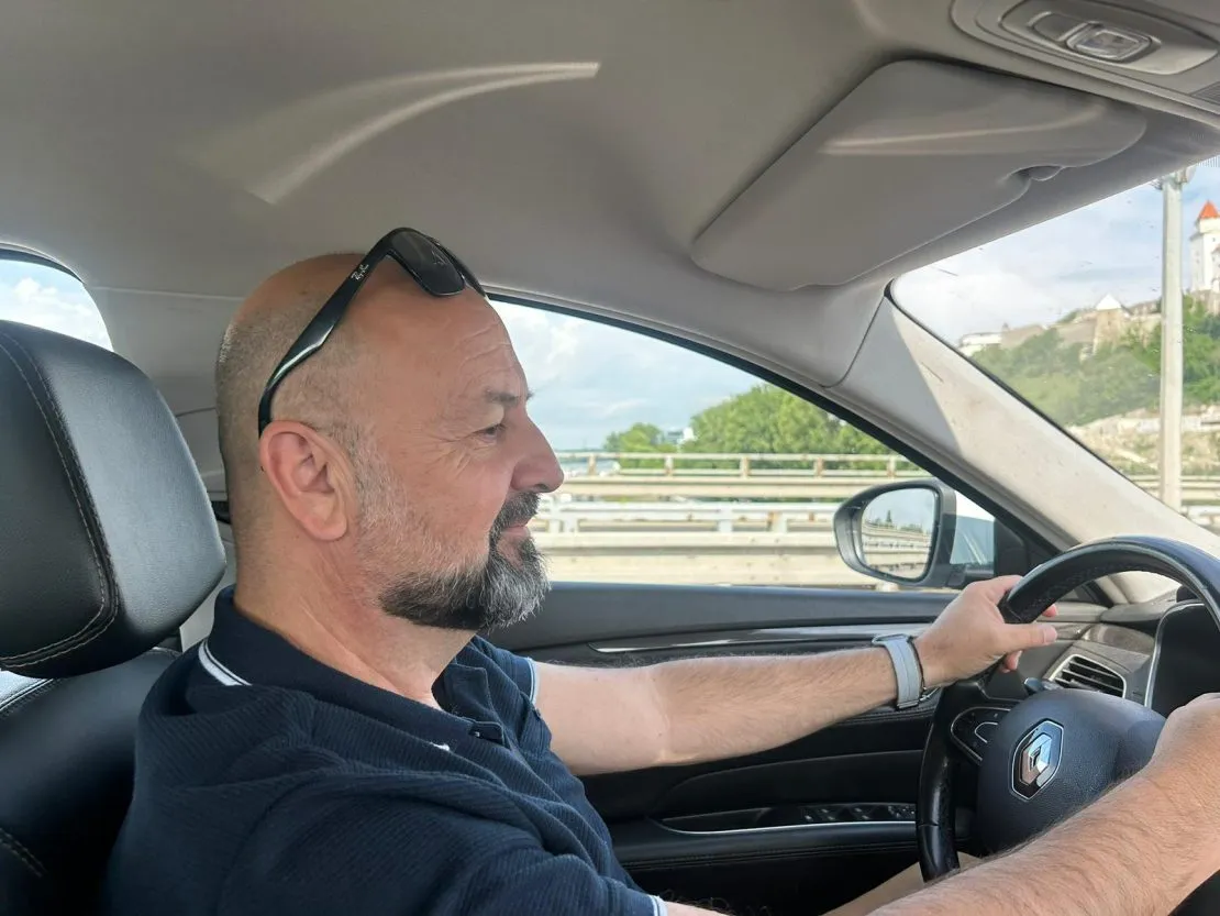 Bernard behind the wheel of his Renault Espace