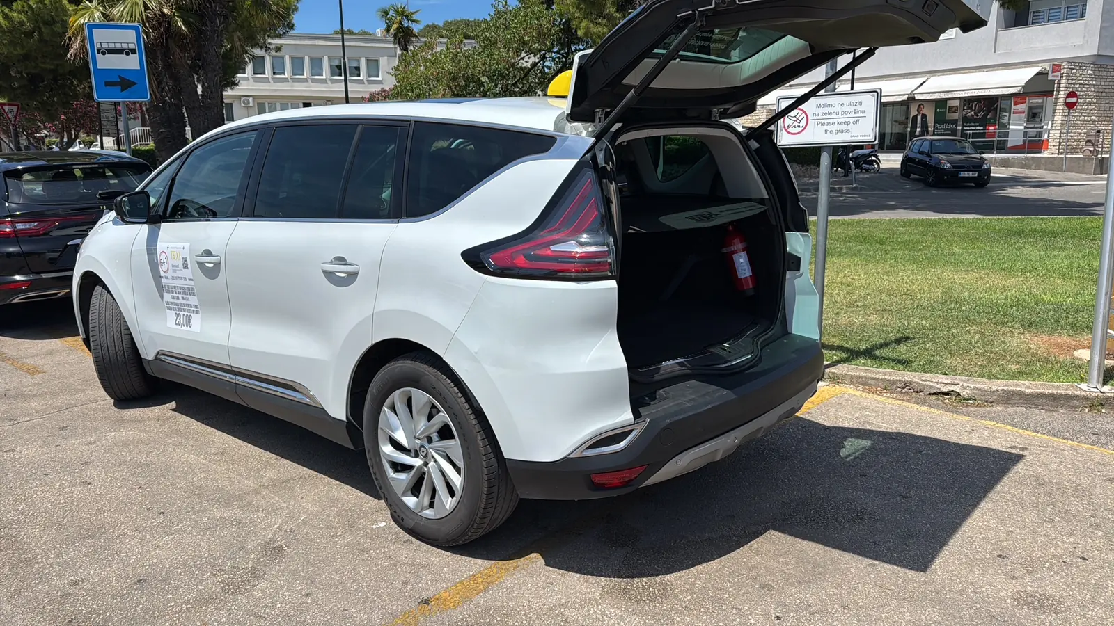 Open trunk of Bernard's Renault Espace, showing the luggage space